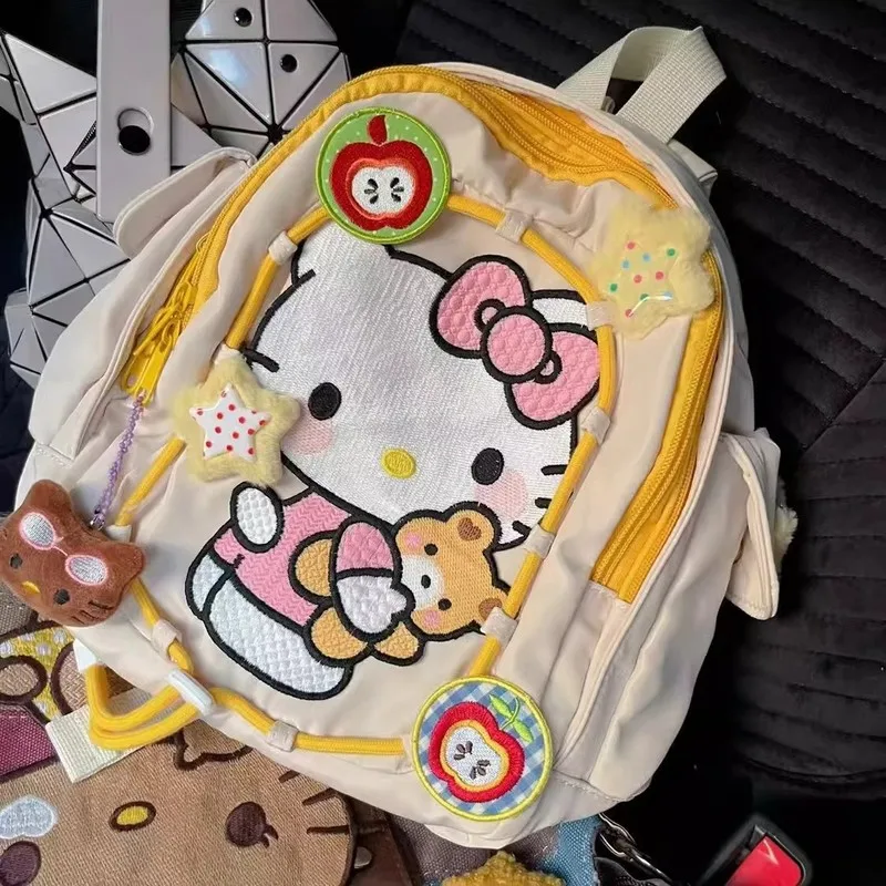 Mochila con estampado de Hello Kitty Sanrio, mochila para estudiantes a prueba de polvo, mochila de viaje multifuncional Simple, regalo de Navidad para niña