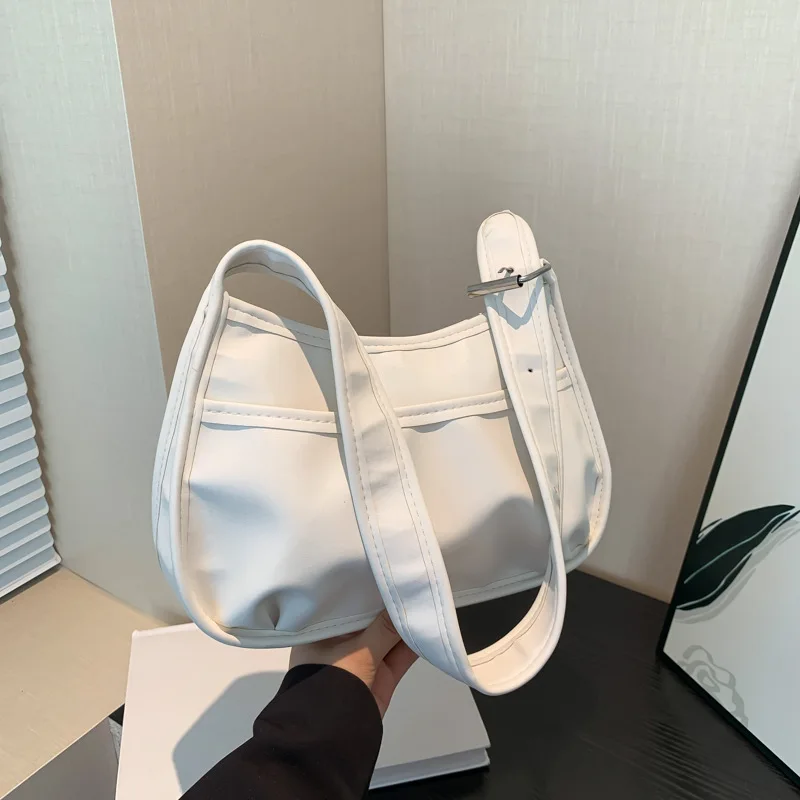 

Лето 2025 г., седельная сумка с широким ремешком, модная сумка через плечо под мышками, уникальный дизайн, сумка на плечо для женщин, стильная, универсальная