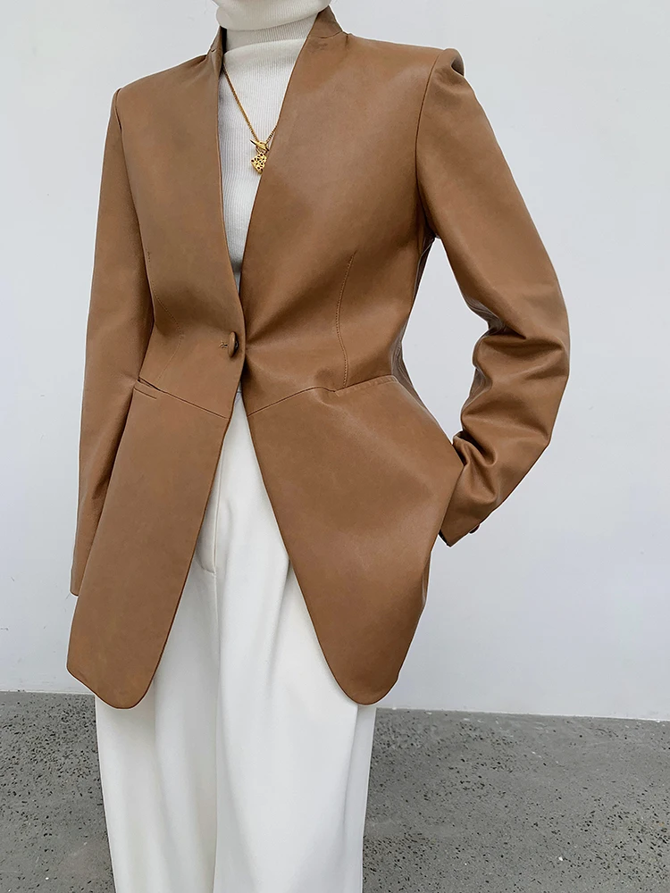 เสื้อแจ็คเก็ตหนังแกะทรงวีคอแบบเรียบง่ายสำหรับผู้หญิง ความยาวปานกลาง ทรงหลวม ช่วยให้ดูผอมเพรียว แฟชั่นฤดูใบไม้ร่วง