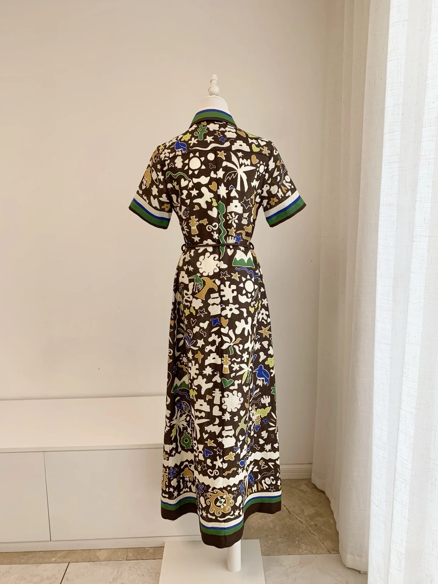 Image of Damen Polokragen Einreihiges Leinen-Maxikleid