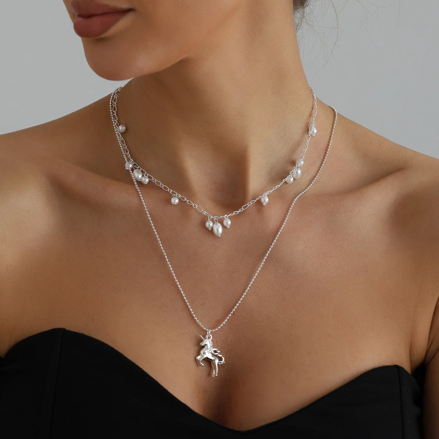 Cross border jewelry pearl spike unicorn pendant U-shaped necklace ins niche design fine bead chain necklace