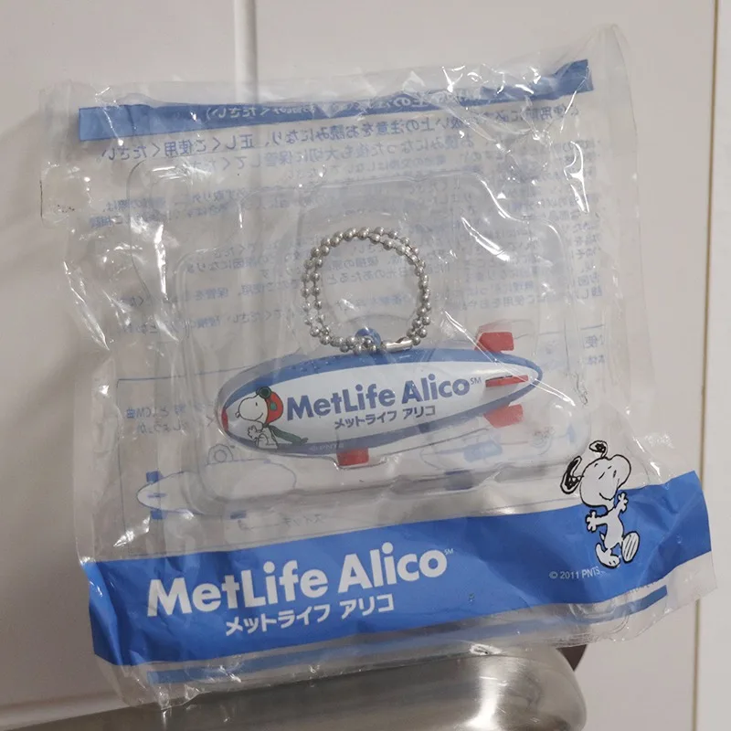 Figura Snoppy, muñeco de perro blanco, modelo de avión, bolso, llavero colgante, juguete de colección para niños