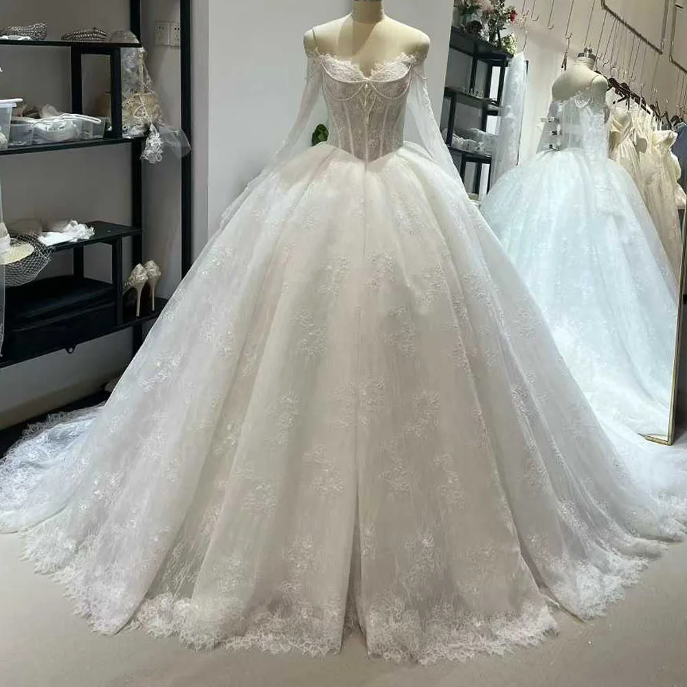 

Elegant Long Sleeve Sweetheart Ball Gown Wedding Dress Pearls Embroidery Bridal Dress