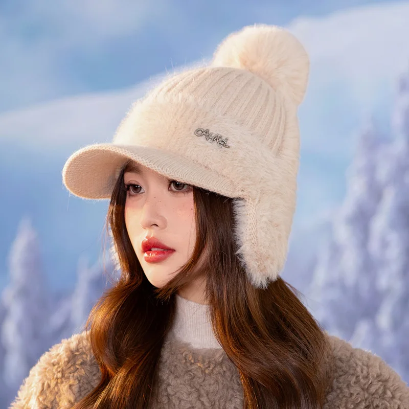 

Women's winter knitted hat. Korean style, versatile. Thickened with ear protection. Fashionable and warm peaked cap.