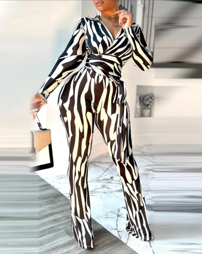 

Color blocked zebra striped printed V-neck long sleeved jumpsuit