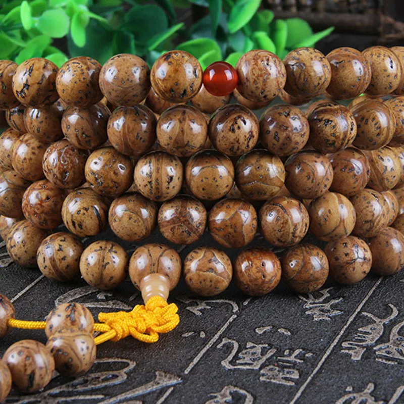 Natural , polished Longan Bodhi seeds, 108 beads for Buddhist prayer, Qilin and tiger eye designs