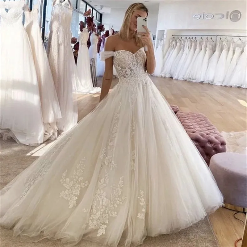 

ANGELSBRIDEP Off-Shoulder Tulle Wedding Dress Formal Robe De Mariee Charming Flower Appliques Sexy Ball Gowns Corset Plus Size