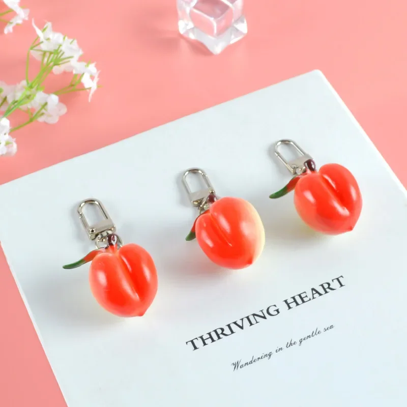 New Simulation Peach Keychain Creative Fashion Fruit PVC Honey Peach Photography Model Props Car Bag Pendant Ornament Gift Women