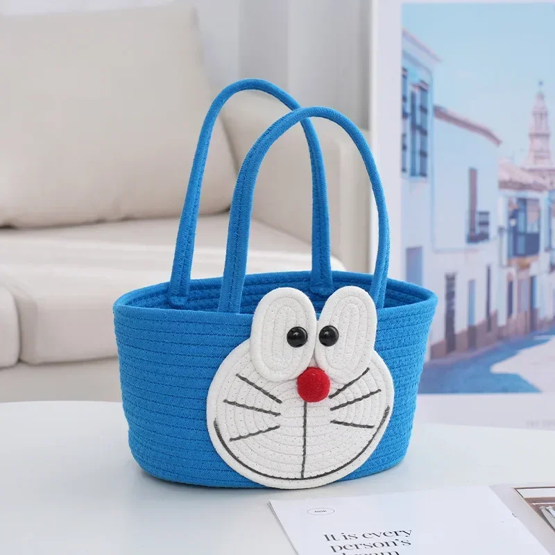 Cartoon Doraemon borsa a tracolla Dingdang Cat Cotton Rope Woven Handbag borsa per pannolini da viaggio borsa per la conservazione dei cartoni animati