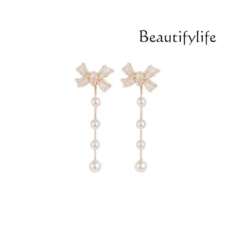 Exquisite light luxury bow earrings, new thin temperament, long pearl earrings, high-end sense