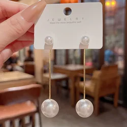 Long fringe pearl earrings simple high sense long drop earrings studs fashion temperament a pair of women wearing earrings