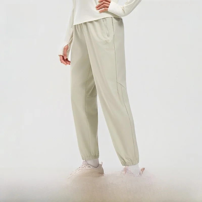 

XTEP Women's Fitn Running Trousers 2026 Spring New Asymmetrical Loose Fit Long Pants l Waist Nylon Spandex