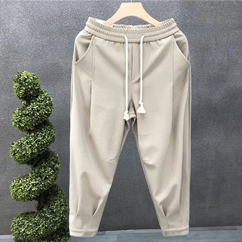 

New Autumn Fashion Trendy Brand Waffle High Grade Feeling Tie Feet Haren Loose Versatile and Handsome Men's Casual Guard Pants