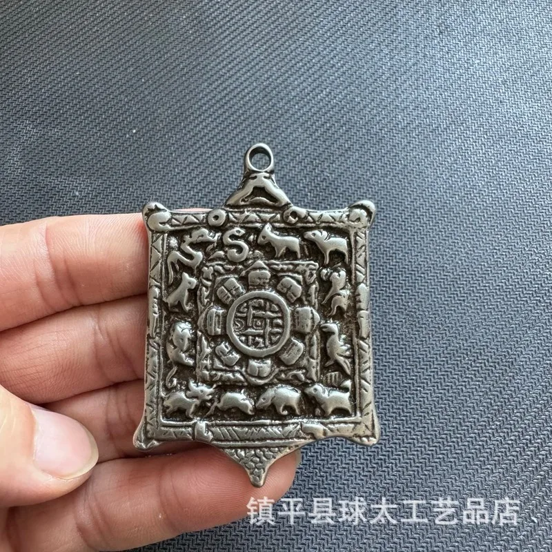 Nepal Iron Engraved Amulet With Zodiac Signs, Nine Palaces, Eight Trigrams, And Snow Lion Pendant