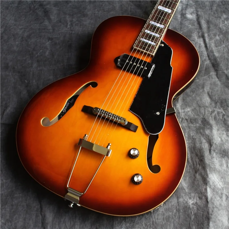 Jazz guitar with F hole design offering rich tone and excellent resonance for versatile electric guitar performances