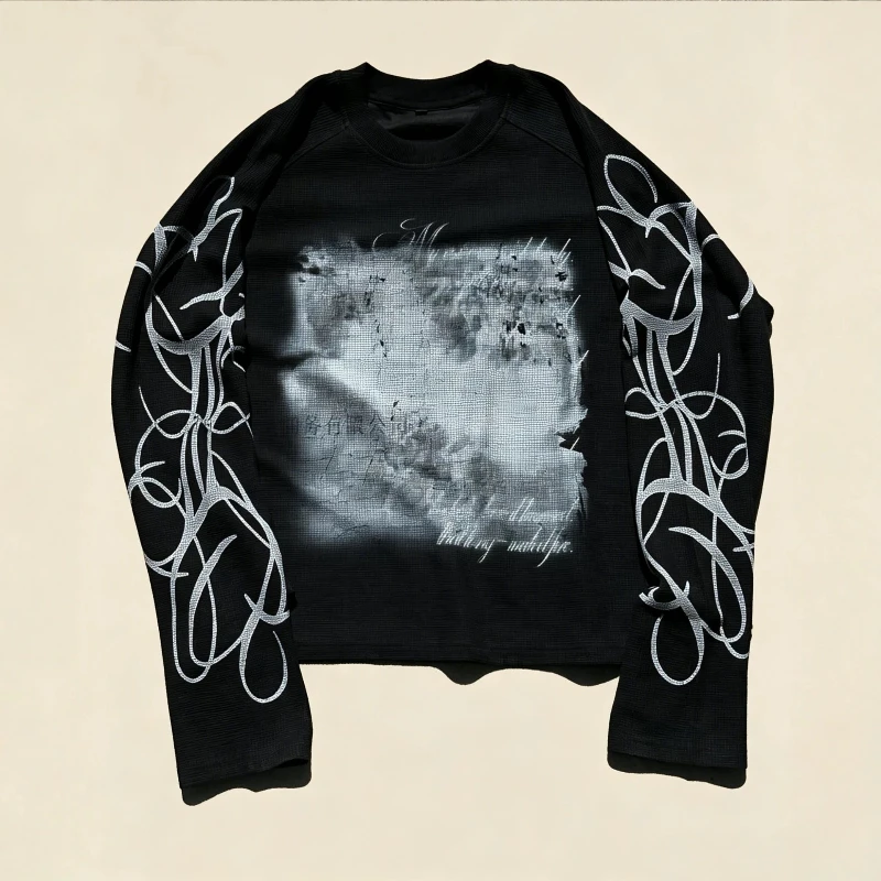 Black shoulder length long sleeved T-shirt with distressed block print and floral vortex pattern Y2K street style unisex top