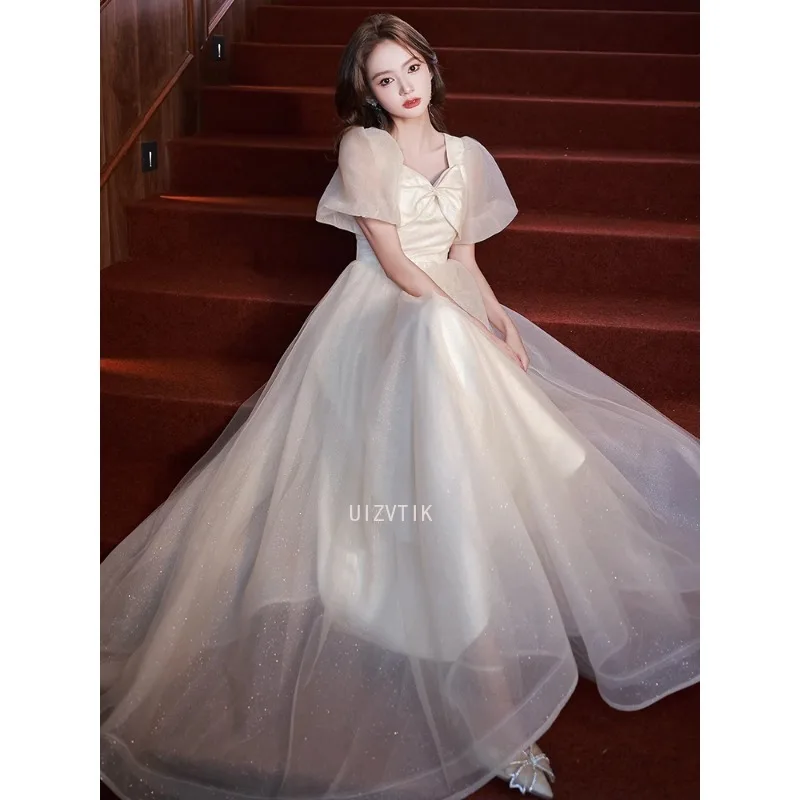 فستان الحفلات المسائية بلون الشمبانيا أنيق بفيونكة قابلة للطي وياقة مربعة فساتين مناسبة رسمية بسيطة بلينغ بلينغ فساتين زفاف طويلة