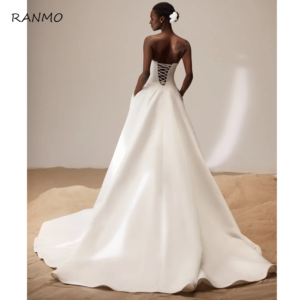 Simple Wedding Dress Ivory Stain Strapless A Line Modern Wedding Gowns for Women 2023 Bride Pockets Lace Up Backless Brial Dress