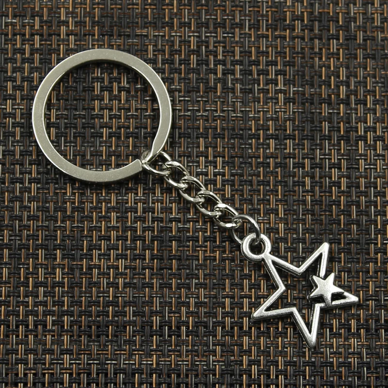 LLavero de Metal chapado en Color plata y bronce antiguo, colgante de Doble Estrella hueca, joyería de moda, 30mm, 27x21mm