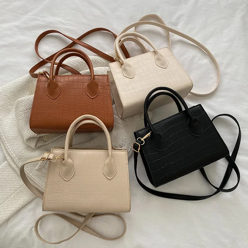 

2024 Spring new women's bag simple handbag temperament shoulder bag leisure commuter crossbody popular bags this year