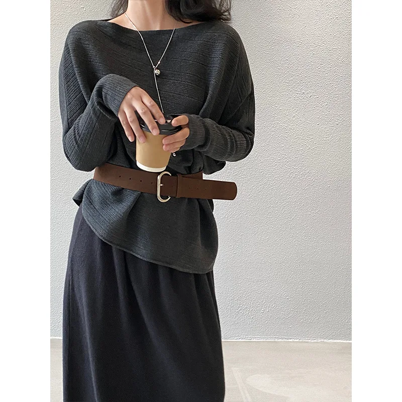 

Long sleeved diagonal shoulder knitted sweater for women in early autumn with belt and irregular top