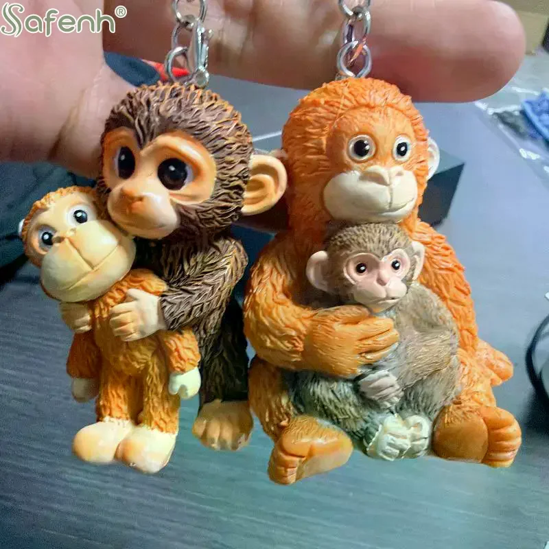 1Pcs Protect Punch Monkey Keychain 3D Cute Punch Monkey Holding Toy Pendant