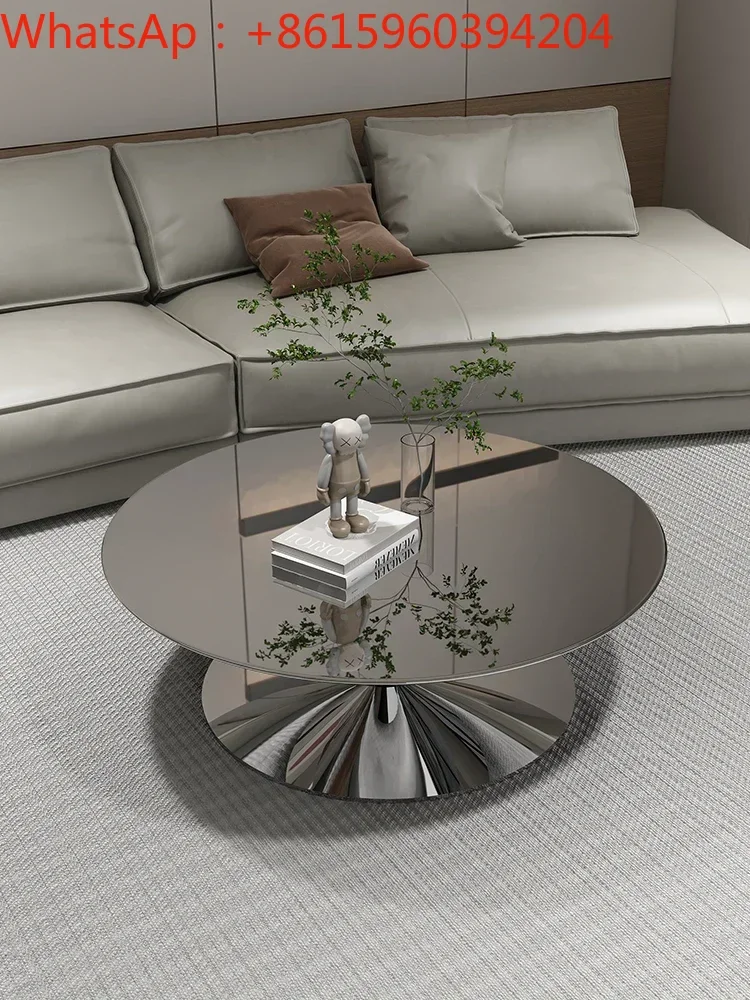 

Flying saucer round coffee table minimal light luxury floating living room household stainless steel mirror simple and modern