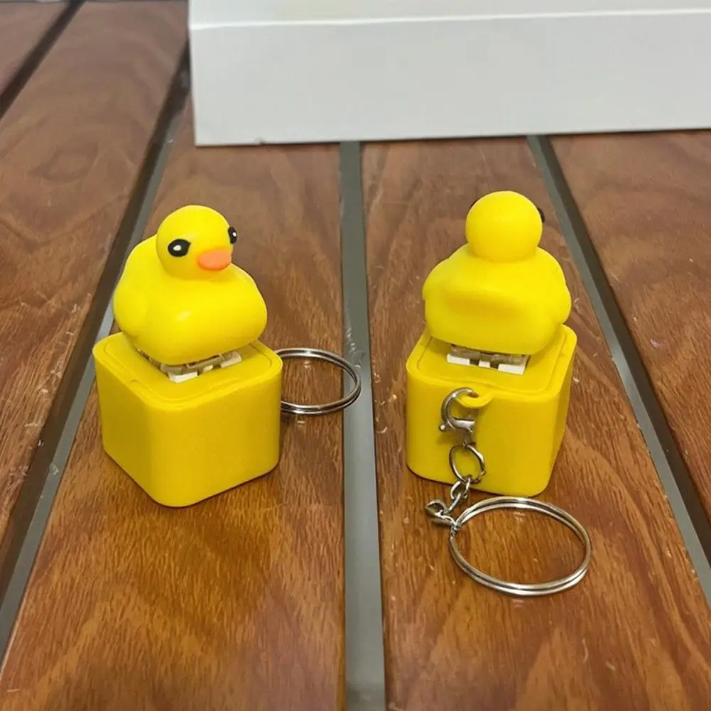 Brinquedo de pato de imprensa com botão, chaveiro de animal com luz LED para brincadeira e diversão, presentes de mordaça de alívio de estresse alimentados por bateria para crianças e adultos
