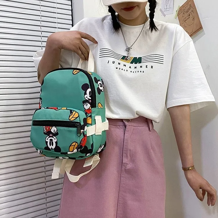 Disney 2023 moda mickey mouse mochila leve feminino bonito pupila leve viagem ao ar livre impressão mochila das crianças