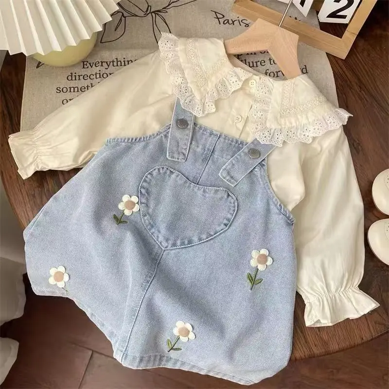 

Girls' Spring and Autumn Set 2025 New Korean Edition Flower Embroidered Cowboy Strap Skirt Doll Collar Shirt Two Piece Set