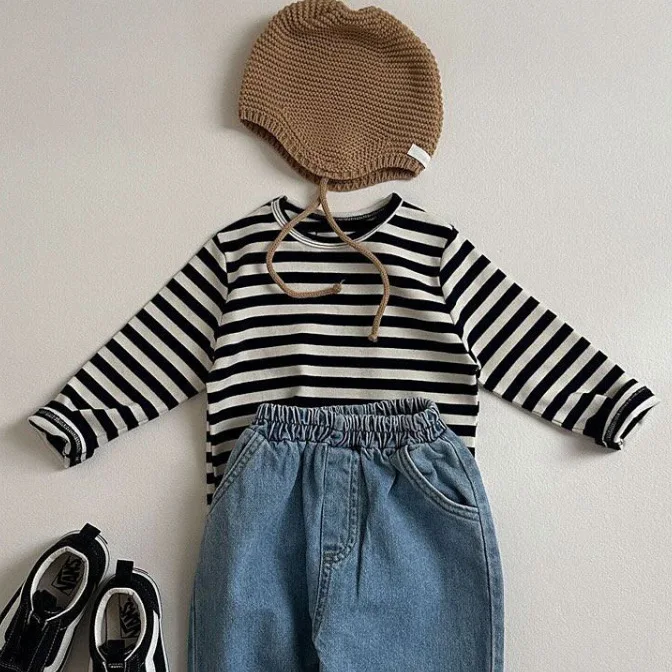 تي شيرت مخطط بأكمام طويلة للأطفال ربيع جديد لعام 2025 تي شيرت غير رسمي للفتيات الرضع تي شيرت للأطفال الصغار ملابس فضفاضة لطيفة للأطفال ملابس أطفال