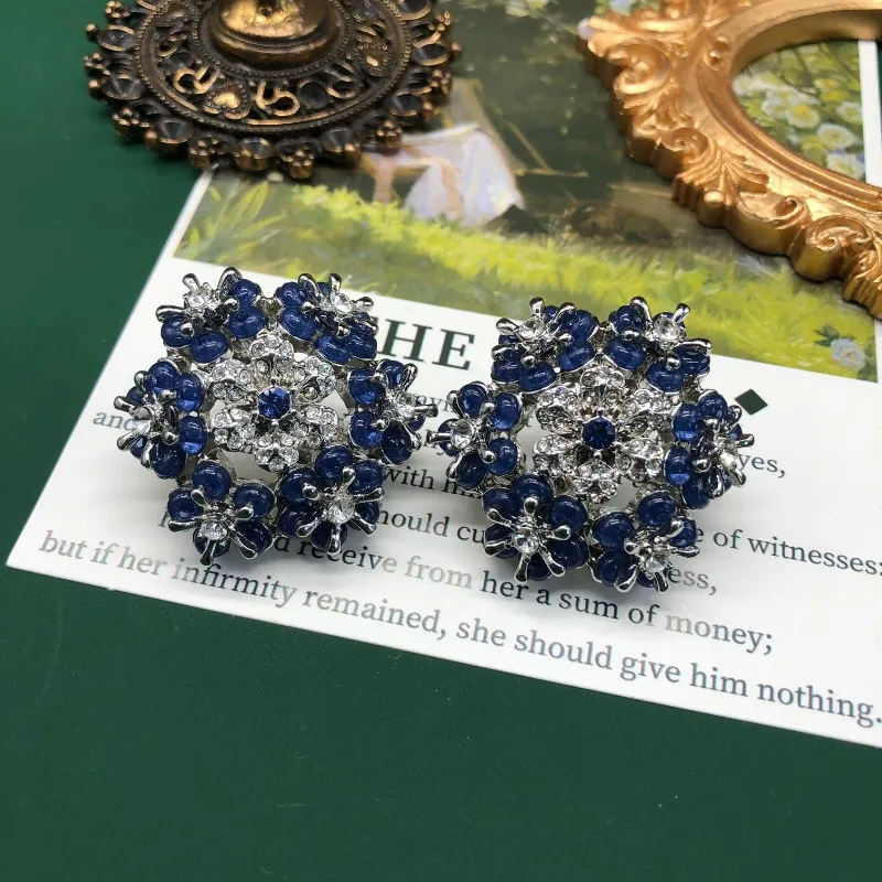 

Medieval Jewelry Light Blue Snowflake Design Sense Flower Exquisite Fashion Stud Earrings Hollow Versatile Temperament Earrings
