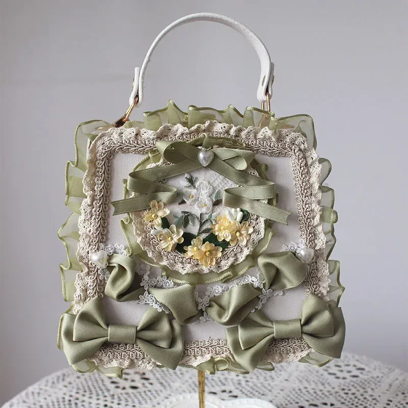 Vintage vittoriano Lolita borse donna elegante fiocco fiore pizzo ricamo borsa Cosplay palazzo principessa Tea Party Dance Bag