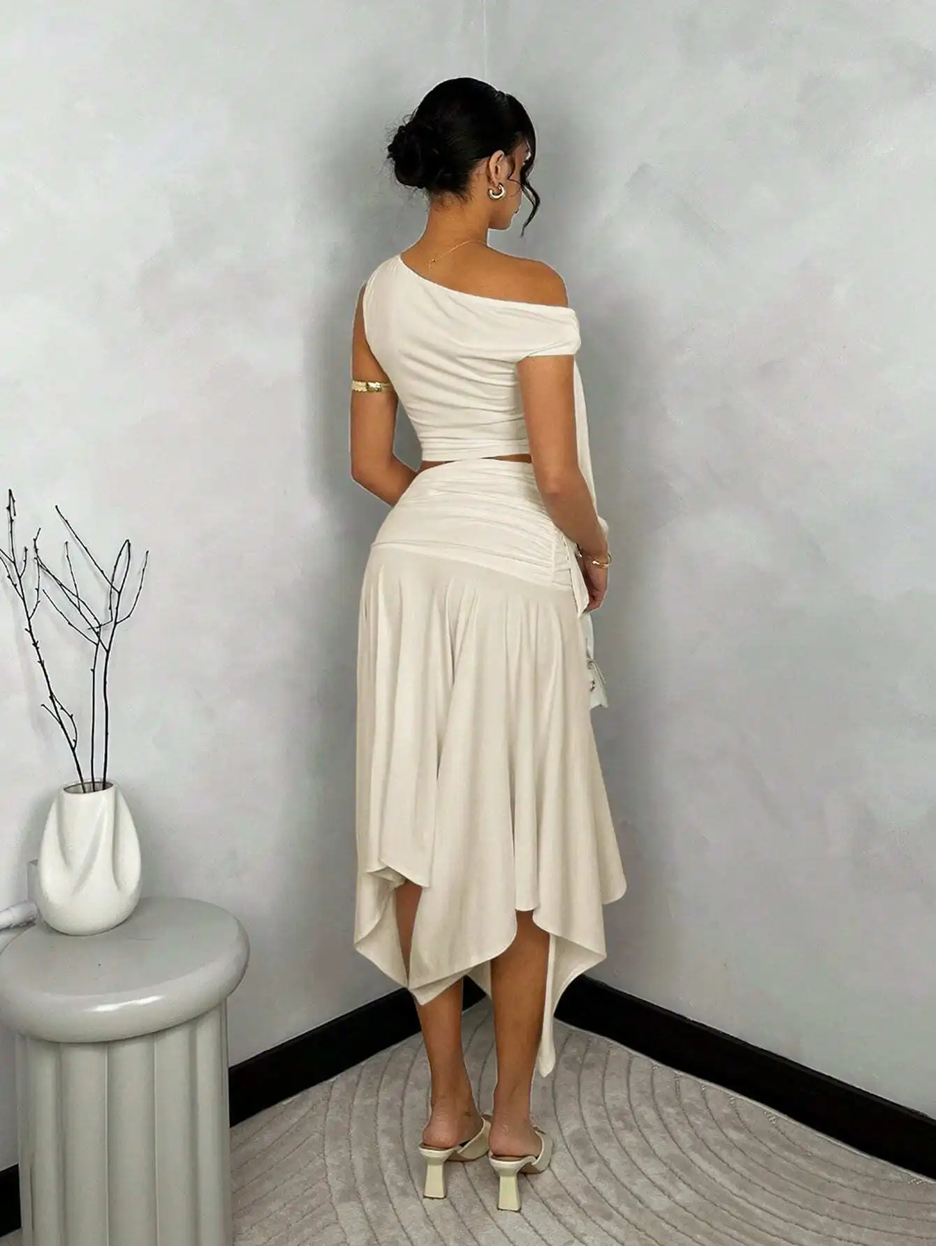 

Women Solid White Asymmetric One Shoulder Crop Top With High Slit Ruched Skirt