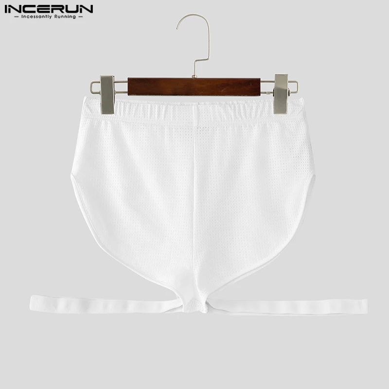 

INCERUN мужские шорты однотонные быстросохнущие летние повседневные мужские шорты для отпуска 2025 уютные полые мужские шорты нестандартной формы S-3XL