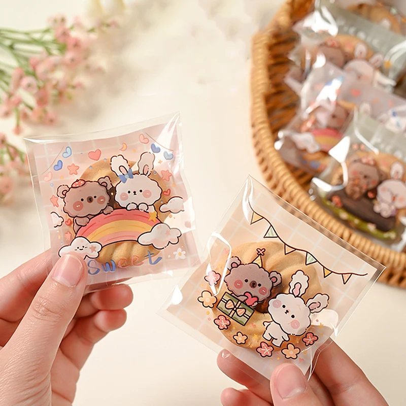 New 100pcs/Lot Plastic Cartoon Cookie And Candy Bags Self-Adhesive Gift Bag For Wedding Party Supplies Biscuit Packaging Bag