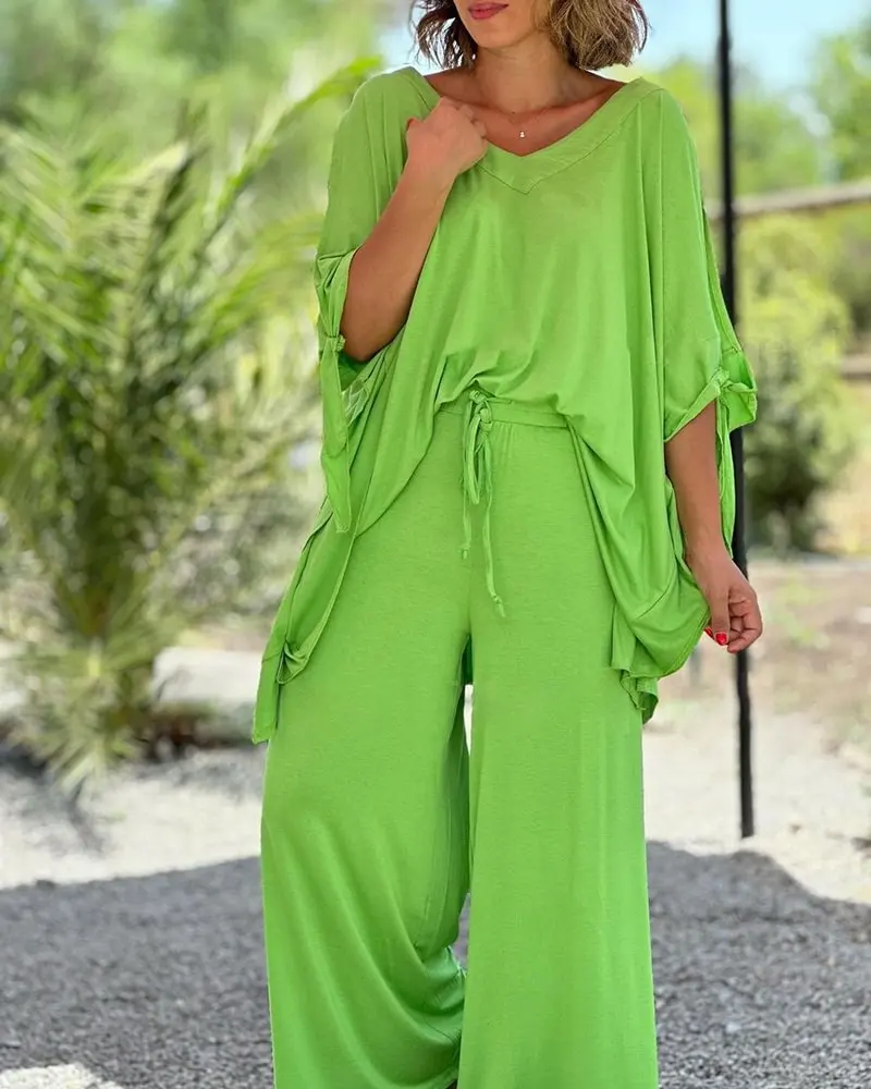 

Женский летний комплект из двух предметов 2025 года с V-образным вырезом и рукавами «пять четвертей», свободные и повседневные однотонные брюки, комплект с широкими штанинами