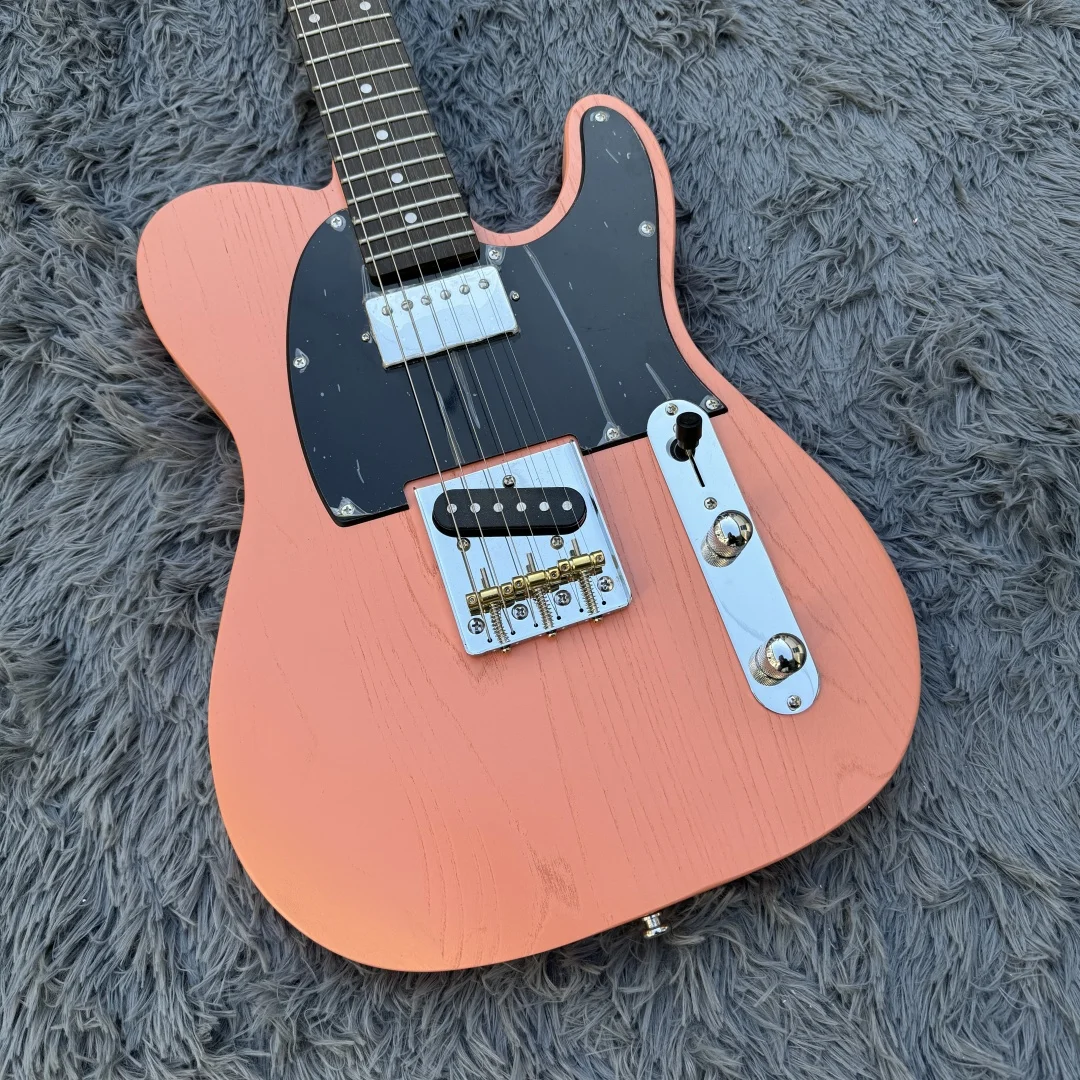 Pink six-string electric guitar Maple neck wood grain basswood body black guard can be customized