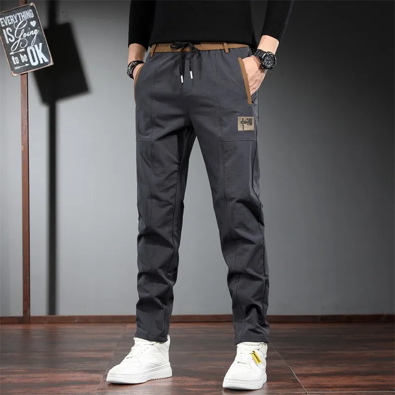 Pantaloni estivi a gamba dritta sottile in seta di ghiaccio Qui Dry Pantaloni lunghi larghi casual sportivi elastici traspiranti per uomo