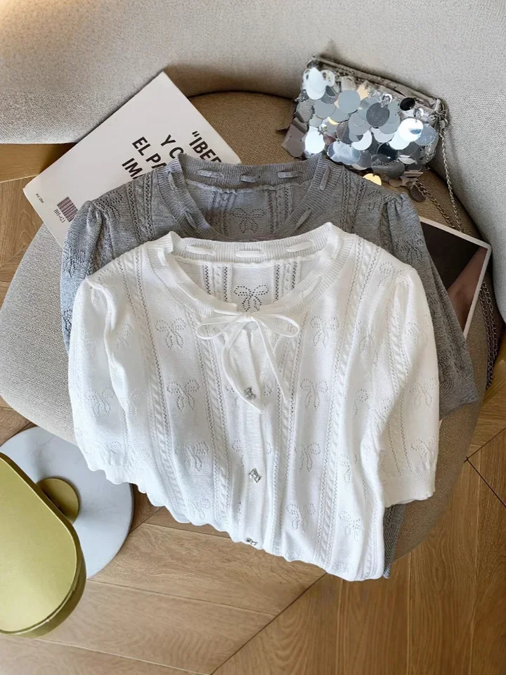 Oco para fora arco doce gelo seda camisola de malha primavera verão manga curta o pescoço solto cardigan topo feminino coreano sólido t