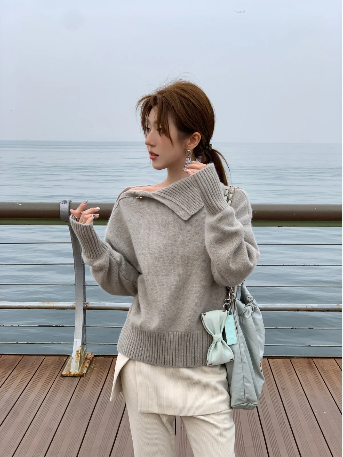 

Zoneelea Song yun Winter Sea Breeze, оригинальный дизайн, свободный высокий свитер с наклонными пуговицами, женский модный трикотаж