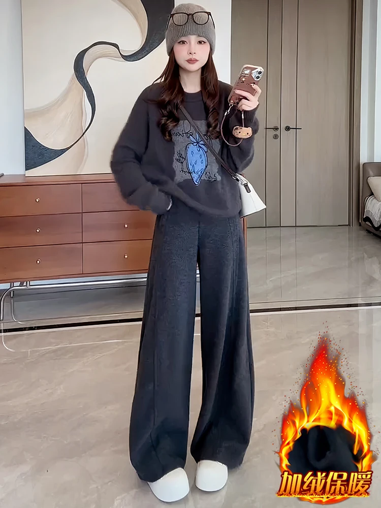 

A set of beautiful autumn winter clothes for women 2025 new round neck printed pullover loose wide leg pants two-piece set