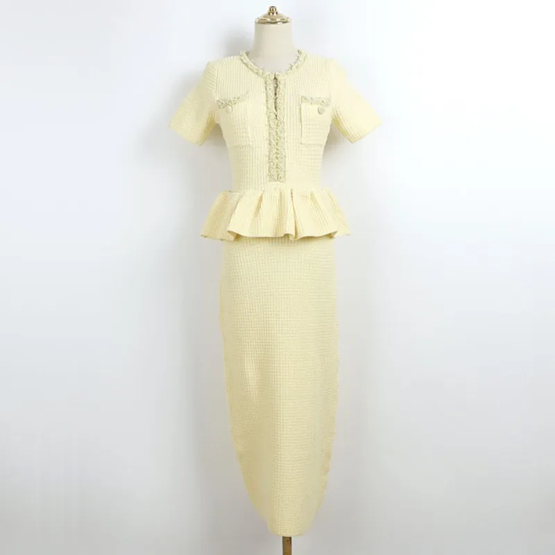   Vestido de punto elástico corto sin mangas 2025 Primavera/otoño/invierno vestido largo con borde de hoja de pescado vestido retro ceñido en la cintura