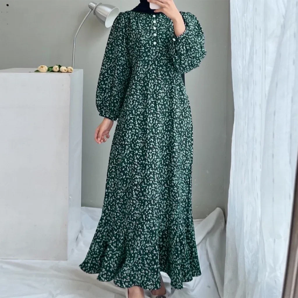 Gamis wanita Muslim Timur Tengah gaya baru Gaun lengan panjang motif longgar mode Arab Dubai dengan kerah kancing.