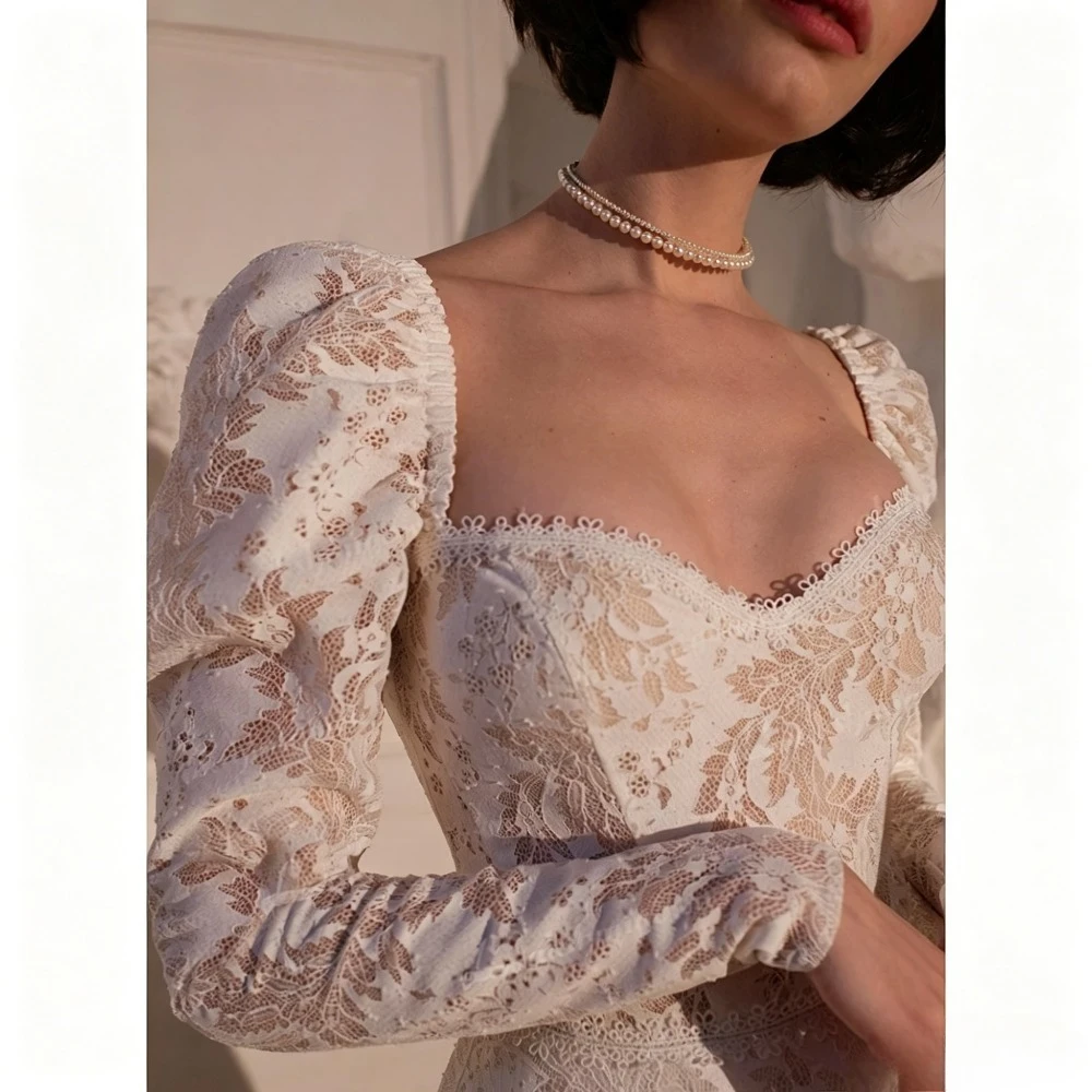 Customized Sexy Sweetheart A-line Decal Wedding Dresses 2026 Popular Long Sleeved Lace Backless Card Shoulder A-line Bridal Gown