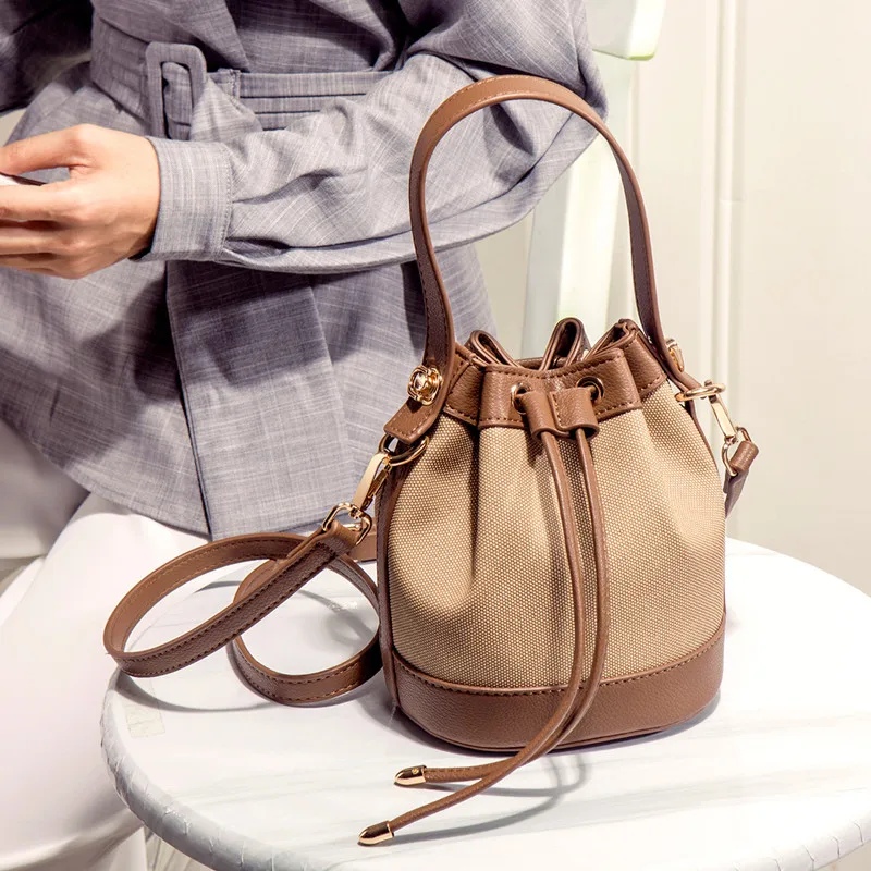 

Fashion Commuter Bucket Bag，2026New Niche Single Shoulder Crossbody Bag，High-end stylish versatile handbag for women，Color Block