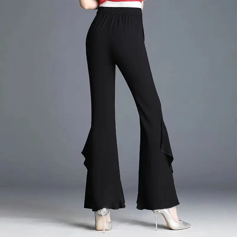 Primavera outono nova cor sólida moda cintura elástica bell-bottoms feminino high street cintura alta babados retalhos calças all-match