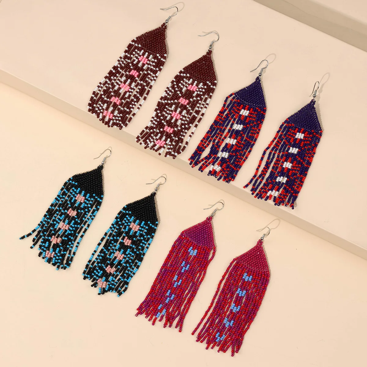 

Beaded earrings Design Originality Rice-shaped Tassel Hand knitting Bohemia Alloy Tide Simple Rice bead earrings