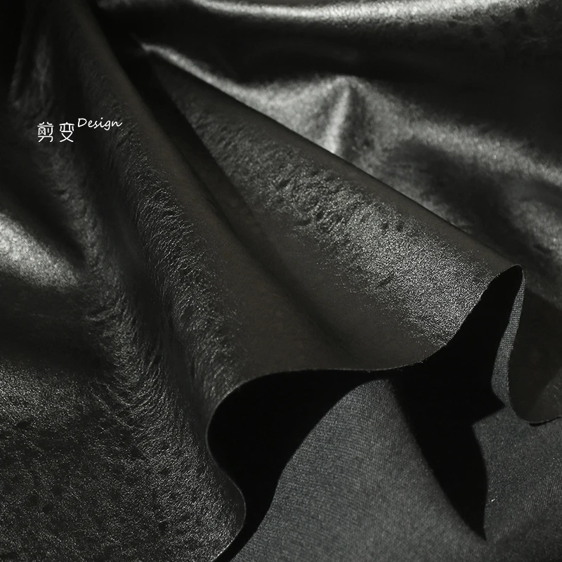 Angola black matte coarse texture artificial environmentally friendly leather pu designer fabric high-end coat clothing fabric