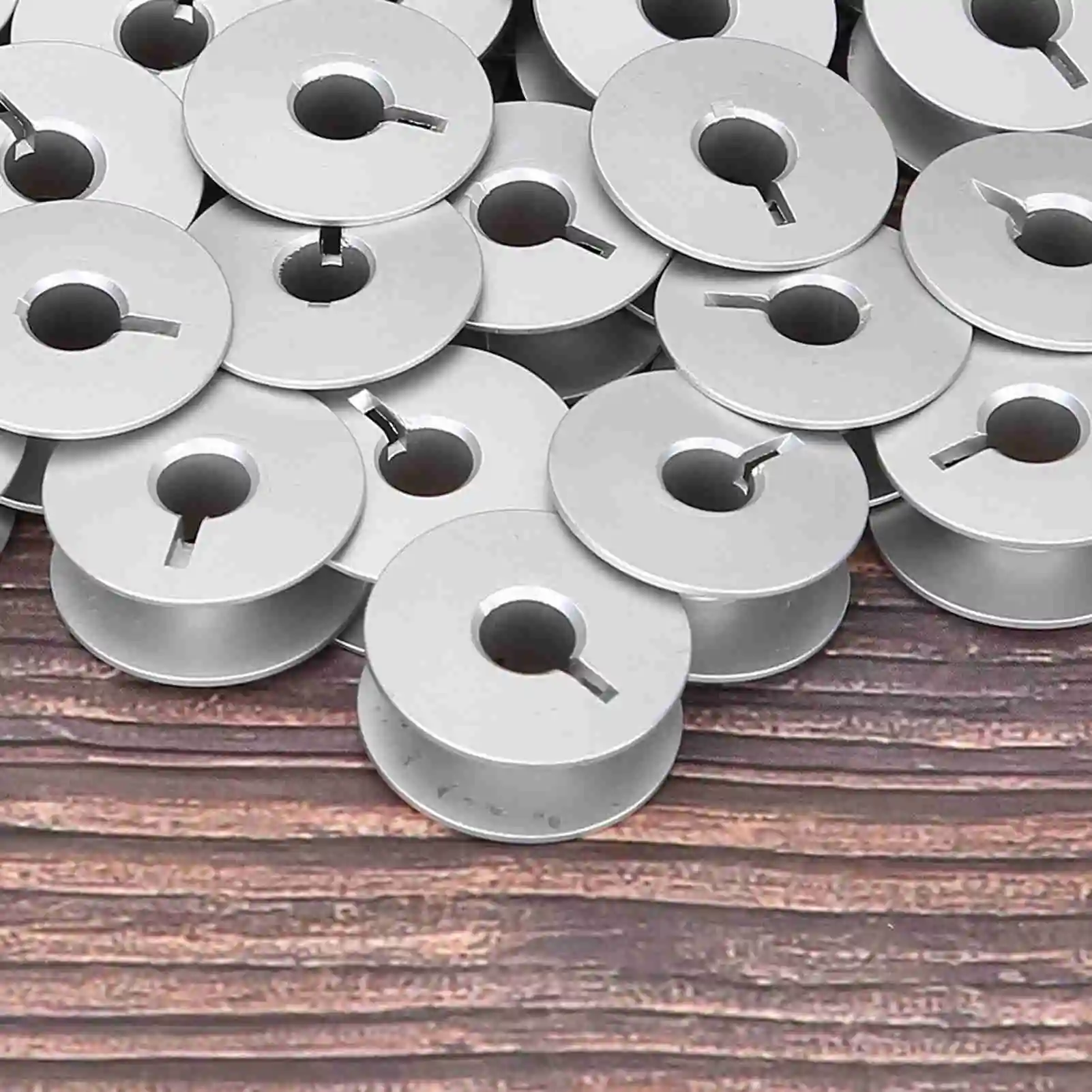 100pcs Sewing Machine Bobbin Thread Bobbin 55623A Aluminum Bobbins Slotted for Industrial Sewing Machine Parts view 6